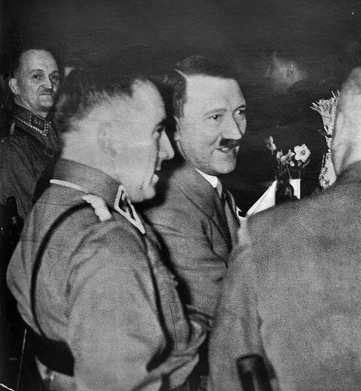Adolf Hitler with the old fighters at Christmas Eve in the Loewenbraeukeller in Munich 